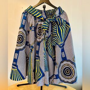 LADDI African print skirt w pockets & ties. UNIQUE FLASHLIGHT DESIGN. One size